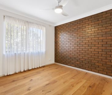 Renovated 2-Bedroom Townhouse in Prime Coburg Location - Photo 2