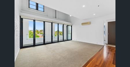 SPACIOUS WAREHOUSE STYLE LIVING IN 'WARATAH MILLS' - Photo 2