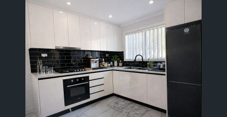 Modern & Spacious 2-Bedroom Granny Flat with Private Backyard - Photo 4