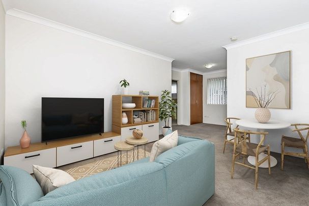 Bright & Convenient One-Bedroom Apartment for Lease in the Heart of Eastwood- Water Included - Photo 1