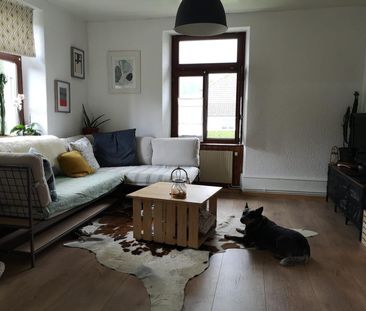 4.5 room apartment with garden and parking space - Photo 2