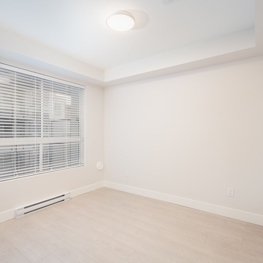 Bright One Bedroom with Secure Parking in Maple Ridge - Photo 1
