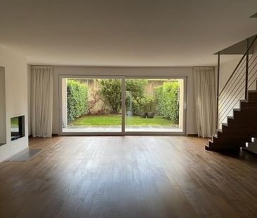 Appartement moderne de 5½ pièces avec jardin, cheminée et cave à vin - Photo 5