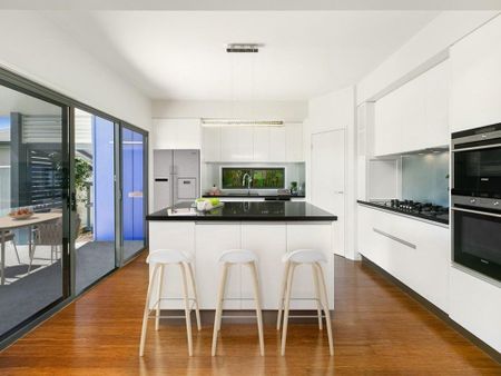 Stylish Coastal Living with Stunning Water Views&excl; - Photo 4