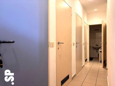 Appartement met 2 slaapkamers en terras in het centrum van Oevel. - foto 4
