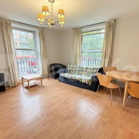 Bright & airy, freshly repainted throughout Mid-Century apartment. - Photo 1