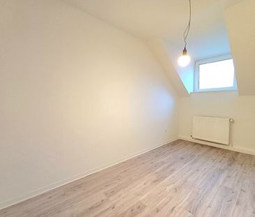 Dachgeschosswohnung in gepflegtem Wohnhaus - Photo 2