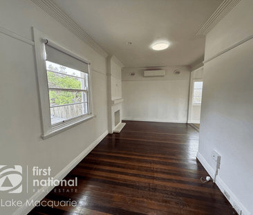 Charming Two-Bedroom Home with Entertaining Deck - Photo 3