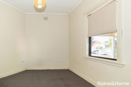 Spacious Four-Bedroom Home in a Prime Central Location - Photo 5