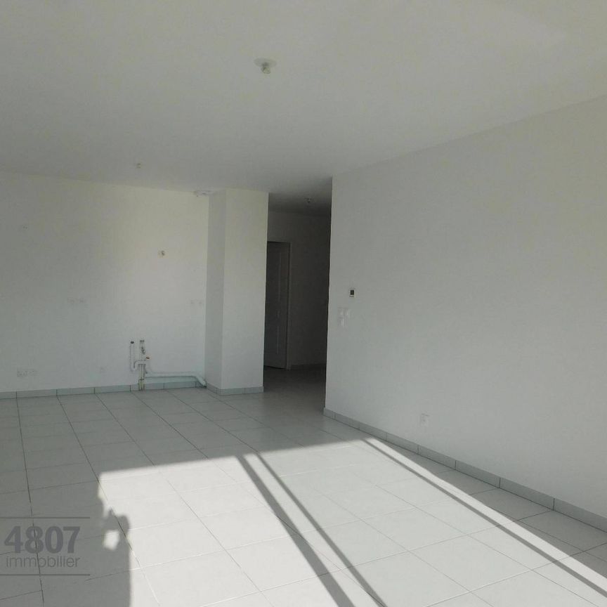 Location appartement 3 pièces 64.77 m² à Saint-Pierre-en-Faucigny (74800) - Photo 1