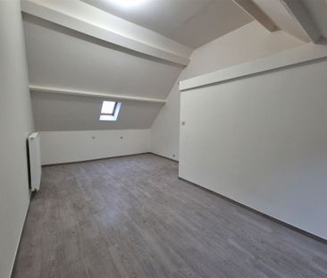 Interessant gelegen recent vernieuwde instapklare rijwoning met koer. - Photo 4