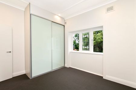 Two Bedroom Apartment with Sunroom Filled with Charm and Character - Photo 3