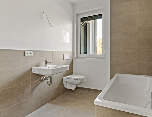 Modernes Wohnen im Neubau – stilvolle 3-Raum-Wohnungen mit zwei Balkonen - Foto 1