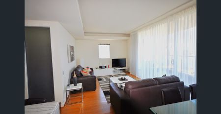 Fully Furnished 2-Bedroom Apartment with Breathtaking City Views - Photo 2