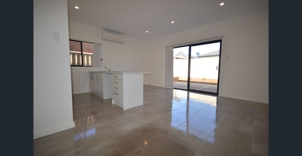 Conveniently Located 3 Bedroom Low Maintenance Home - Photo 1