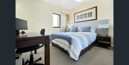 STYLISH FURNISHED APARTMENT WITH WATER VIEWS - Photo 2