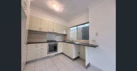 Exquisite, Full Brick, 3-Bedroom Home with Modern Comforts - Photo 4