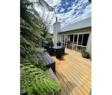 Family home nestled into the native bush - Photo 1