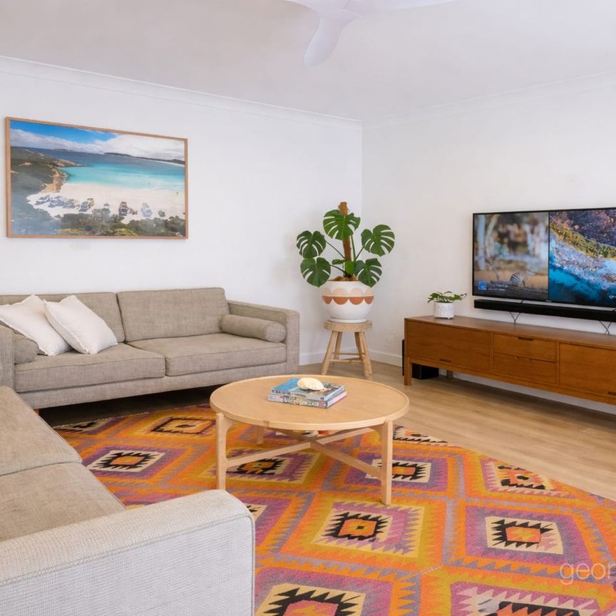 Stylish Coastal Living with Private Garden Oasis - Photo 1