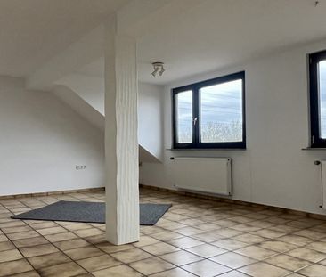 1,5-Zimmer-DG-Wohnung mit Parkplatz - Foto 1