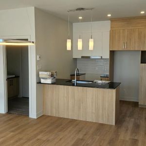 Condo locatif 5 1/2 sur 2 étages construction 2024 CESSION DE BAIL - Photo 2
