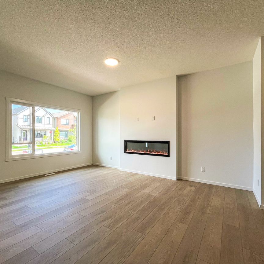 Brand New 3 Bed + Den Family Home | The Orchards | Double Garage | Clubhouse Access - Photo 1