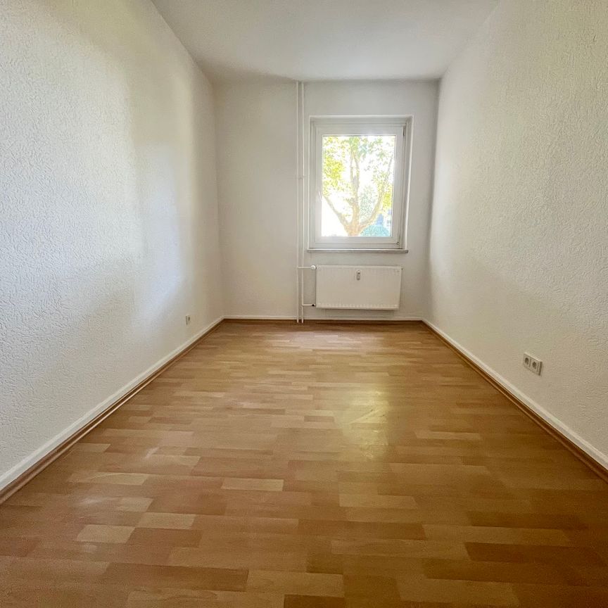 Freundliche 3-Zimmer-EG-Wohnung mit Tageslichtbad! - Foto 1