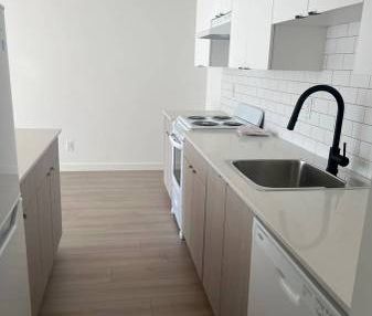 CLOSE TO RCH & SKYTRAIN *BONUS* 1 Bedroom Suites - Photo 1