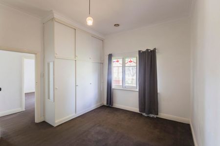 This beautifully presented, spacious three-bedroom home is ideally positioned in a highly sought-after location. - Photo 4