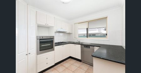 Immaculate Townhouse | Central Location - Photo 2