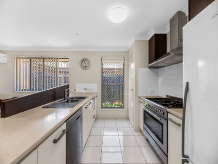 Comfortable and Convenient 4-Bedroom Family Home - Photo 3