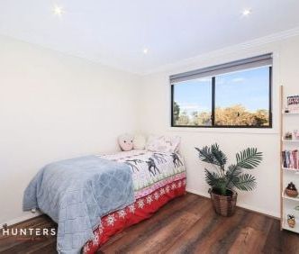 This large brick Duplex is perfect for the entertaining family - Photo 3