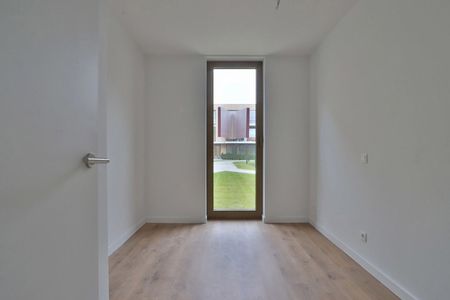 Nieuwbouwappartement met 3 slpks en autostaanplaats nabij centrum Beveren! - Photo 3
