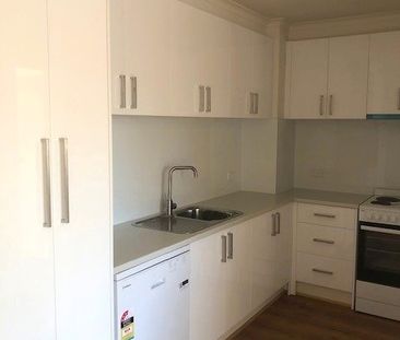 COMPLETELY RENOVATED! - Photo 6
