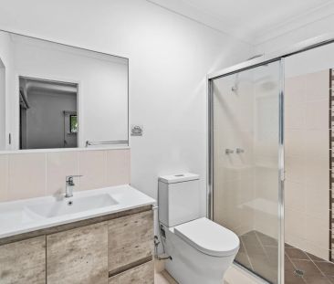 Beautiful family home with solar, batteries + powered shed - Photo 6