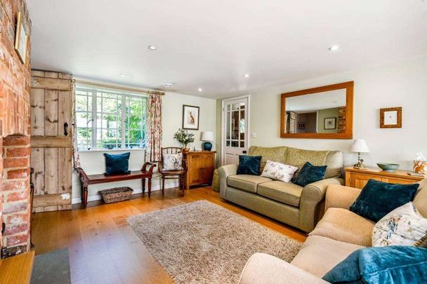 A bright, spacious four bedroom home set within a large plot boasting a superb mature garden with picturesque views. - Photo 1