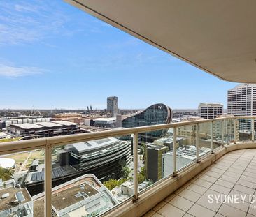 EXQUISITE THREE-BEDROOM APARTMENT WITH STUNNING CITY VIEWS | Furnished - Photo 4