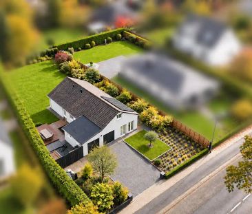 Volledig gerenoveerde bungalow met tuin en dubbele garage te Waasmunster - foto 1
