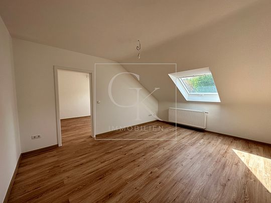 Erstbezug nach Modernisierung von heller gemütlicher DG-Wohnung - Photo 1