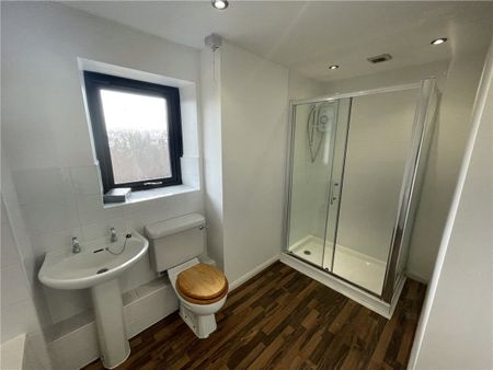 A three bedroom mid-terrace two storey barn conversion with a garage. - Photo 4
