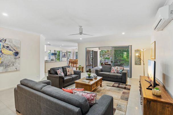 Modern furnished home with pool, steps from Palm Cove Beach - Photo 1