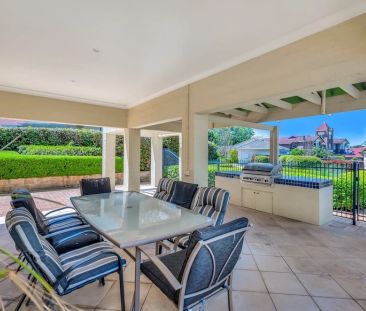 MODERN AND SPACIOUS HOME IN THE EXCLUSIVE MADISON GARDENS! - Photo 1