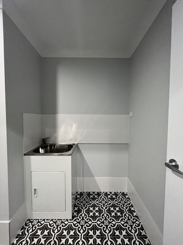 Stylish Modern Home with Ducted A/C & Water Included - Photo 4