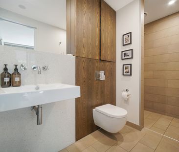 Stylish City-Fringe Apartment with Huge Private Deck - Photo 3