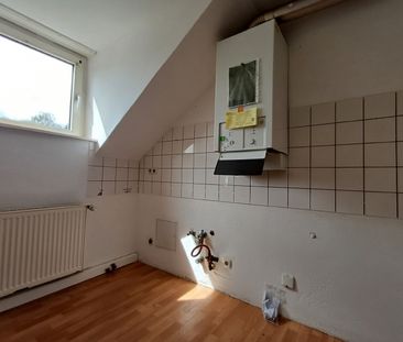 Dachgeschosswohnung in gepflegtem Wohnhaus - Photo 1
