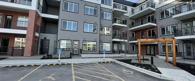 Brand New 2 Bed/2 Bath Condo in Wolf Hollow | 111 Wolf Creek Drive Southeast, Calgary - Photo 1