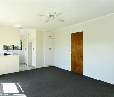 Modern unit close to town and hospital! - Photo 3