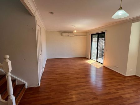 Neat & Tidy Townhouse in a Convenient Location - Photo 2