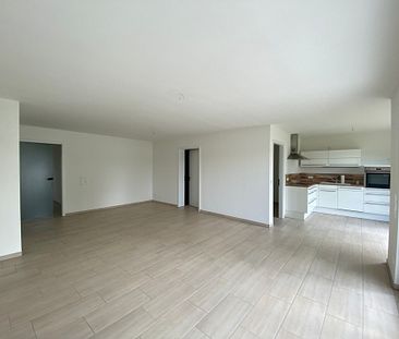 Wohlfühlen pur: Moderne Wohnung in erster Seereihe! - Photo 1