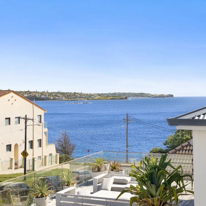 STUNNING COASTAL ARCHITECTURAL ABODE FLOODED IN NATURAL LIGHT - Photo 1